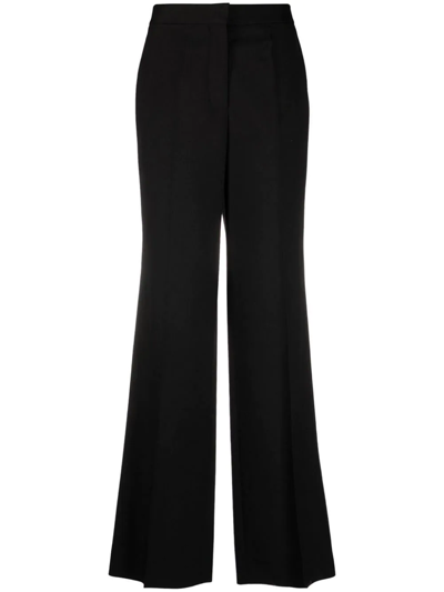 Shop Stella Mccartney Wool Flared Trousers In Black