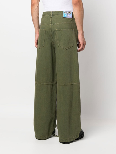 Shop Moschino Mid-rise Wide-leg Jeans In Green