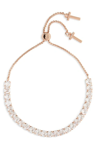 Shop Ted Baker Melrah Icon Crystal Slider Tennis Bracelet In Rose Gold Tone Clear Crystal