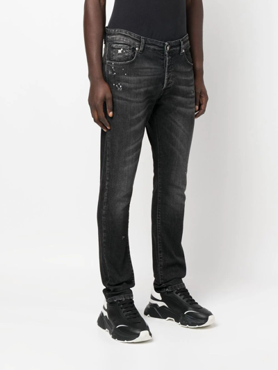 Shop John Richmond Low-rise Slim-cut Jeans In Black