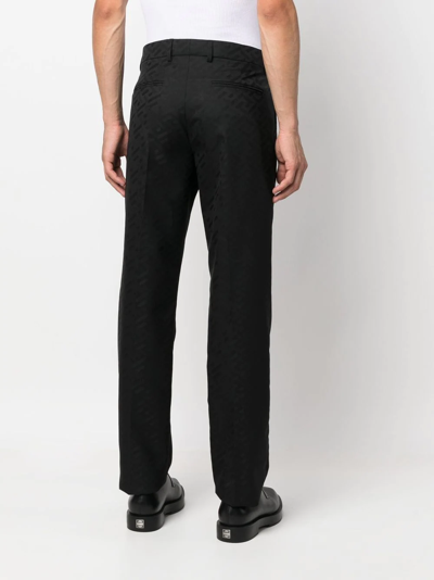 Shop Versace Greca-print Straight-leg Tailored Trousers In Schwarz