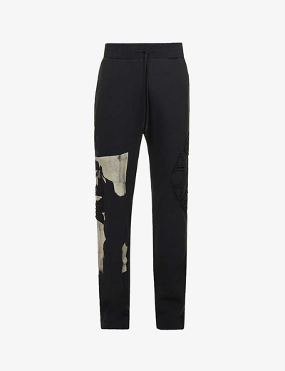 Shop Alyx Graphic-print Regular-fit Tapered-leg Cotton-blend Jogging Bottoms In Black