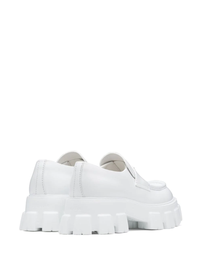 Shop Prada Moonlith Brushed Leather Loafers In White