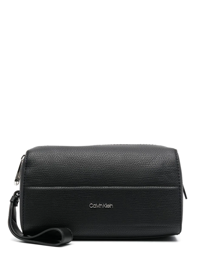 Shop Calvin Klein Embossed-logo Detail Wash Bag In Black