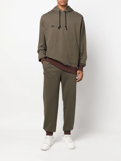 Shop Helmut Lang Logo-print Track Pants In Green