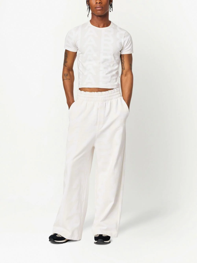 Shop Marc Jacobs Monogram Oversized Track Pants In White
