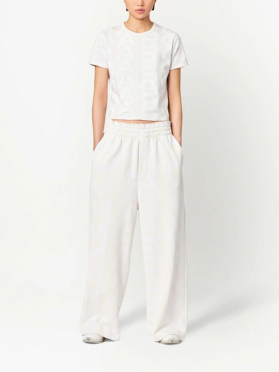 Shop Marc Jacobs Monogram Oversized Track Pants In White