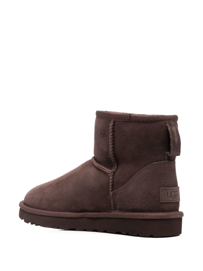 Shop Ugg Classic Mini Ii Shearling Ankle Boots In Brown