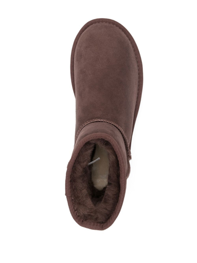 Shop Ugg Classic Mini Ii Shearling Ankle Boots In Brown