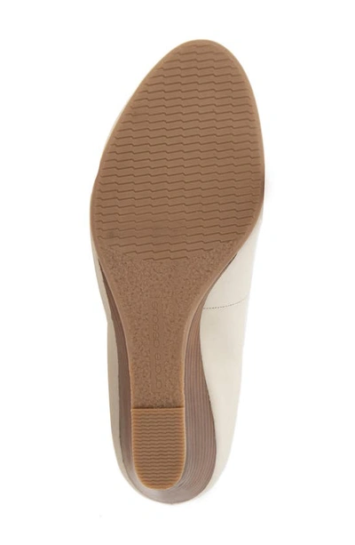 Shop Andre Assous Khloe Featherweight Wedge Pump In Linen