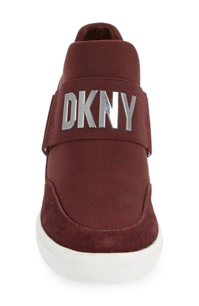 Shop Dkny Cosmos Wedge Sneaker In Bordeaux