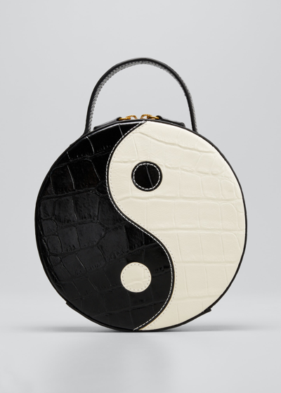 Shop Staud Yin Yang Round Moc-croc Crossbody Bag In Black/cream