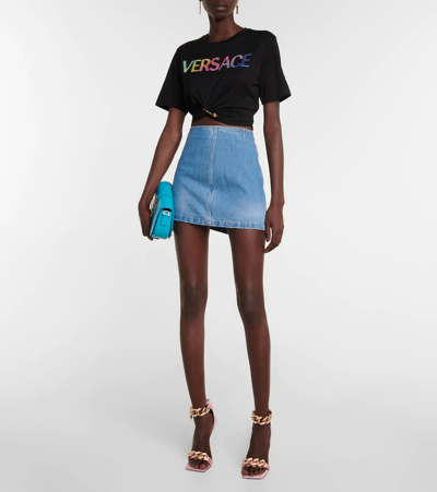 Shop Versace Low-rise Denim Miniskirt In Medium Blue