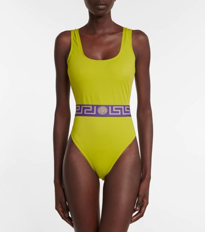 Shop Versace Greca Printed Swimsuit In Pale Avocado+purple