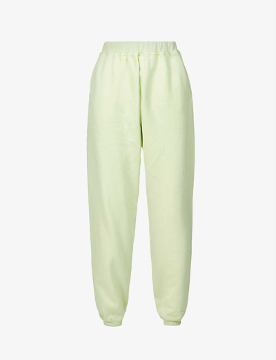 Shop Aries Temple Brand-print Cotton-jersey Jogging Bottoms In Pastel Green