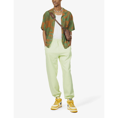 Shop Aries Temple Brand-print Cotton-jersey Jogging Bottoms In Pastel Green