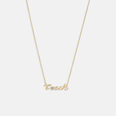 Shop Coach Outlet Logo Script Necklace In Yellow