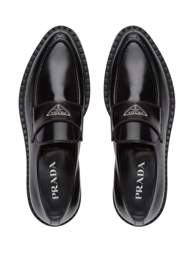 Shop Prada Logo-plaque Loafers In Black