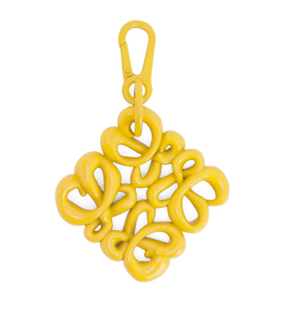 Shop Loewe Inflated Anagram Charm In Yellow