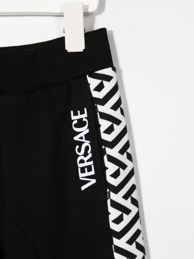 Shop Versace Greca Pattern Cotton Track Pants In Black