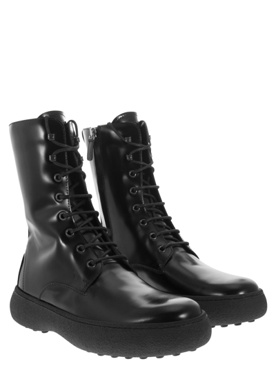 Shop Tod's Leather Lace-up Boot In Black