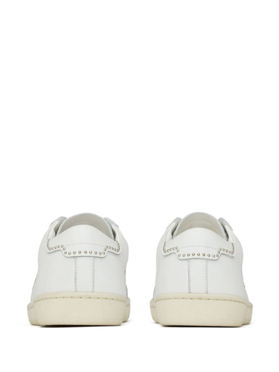 Shop Saint Laurent Studded Low-top Leather Sneakers In White