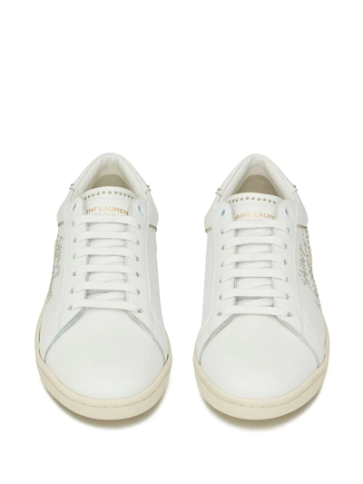 Shop Saint Laurent Studded Low-top Leather Sneakers In White