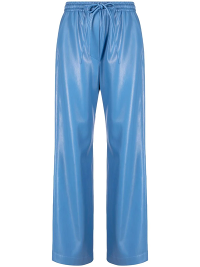 Shop Nanushka Faux-leather Drawstring-waist Trousers In Blue