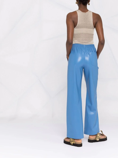 Shop Nanushka Faux-leather Drawstring-waist Trousers In Blue