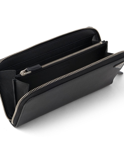 Shop Prada Saffiano Zip-around Continental Wallet In Black