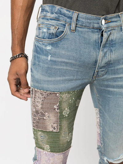 Shop Amiri Distressed Patchwork Skinny Jeans In 408 Clay Indigo