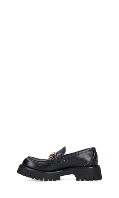 Shop Gucci Carrarmato Loafers With Clamps