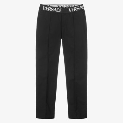 Shop Versace Teen Boys Black Logo Trousers