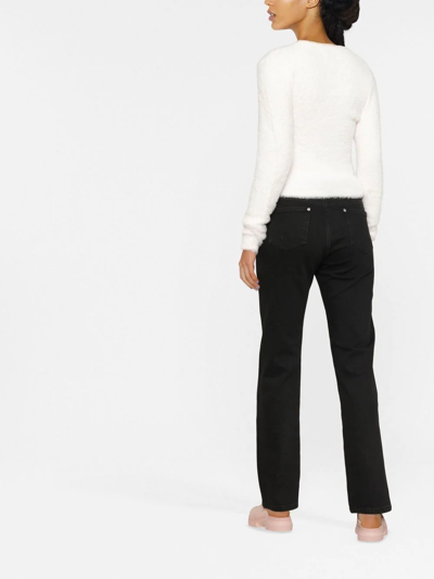 Shop Chiara Ferragni Star-print Straight-leg Trousers In Black