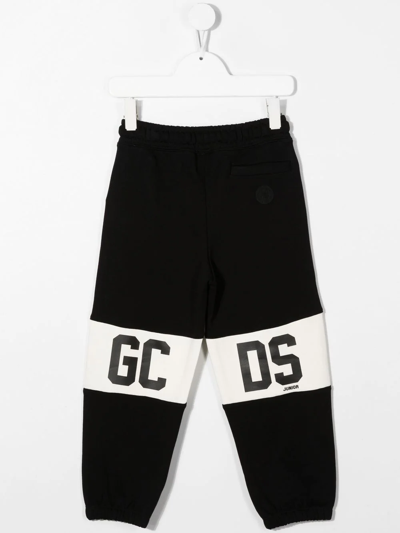 Shop Gcds Printed Tracksuit Bottoms In Black