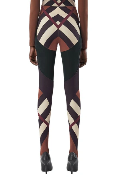Shop Burberry Tully Kissing Check Paneled Stirrup Pants In Dark Birch Brown Pat