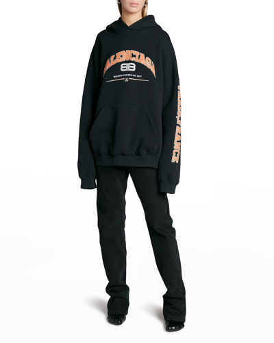 Shop Balenciaga Logo Print Oversized Fleece Hoodie In Black / Orange