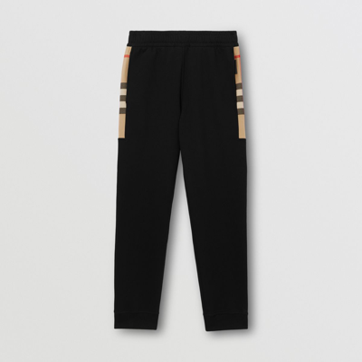 Shop Burberry Check Panel Cotton Jogging Pants In Black/archive Beige