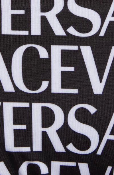 Shop Versace Logo Print Side Tie Bikini Bottoms In Black White