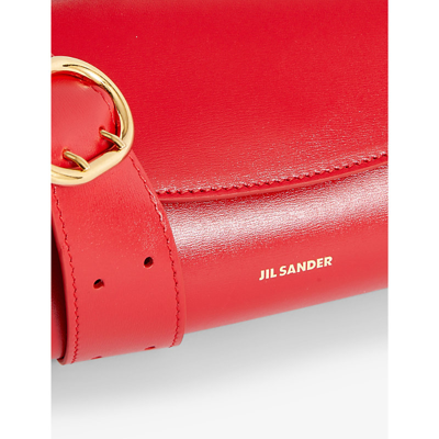 Shop Jil Sander Cannolo Small Logo-embossed Leather Shoulder Bag In Red