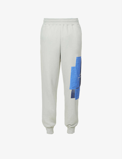 Shop A-cold-wall* Brutalist Puff-print Tapered-fit Cotton-jersey Jogging Bottoms In Light Grey