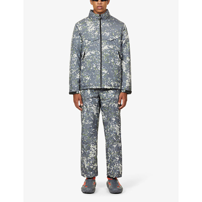 Shop A-cold-wall* Nephin Graphic-print Relaxed-fit Shell Storm Trousers In Mid Grey