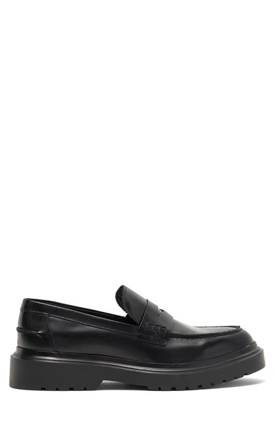 Shop Karl Lagerfeld Lug Sole Penny Loafer In Black