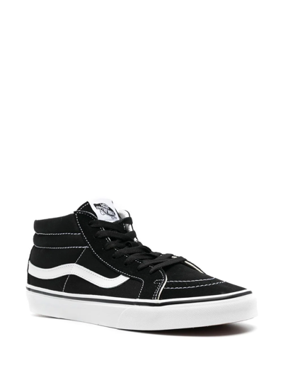 Shop Vans Sk8 Mid Reissue Sneakers In Black