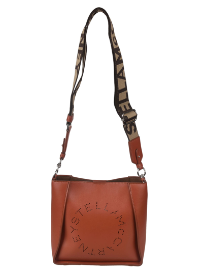 Shop Stella Mccartney Mini Logo Perforated Crossbody Bag In Sierra