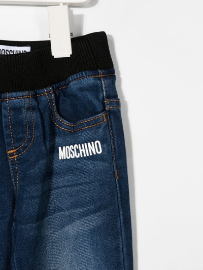 Shop Moschino Logo-print Denim Pants In 蓝色