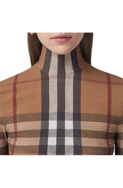 Shop Burberry Emery Check Turtleneck Top In Birch Brown Ip Chk