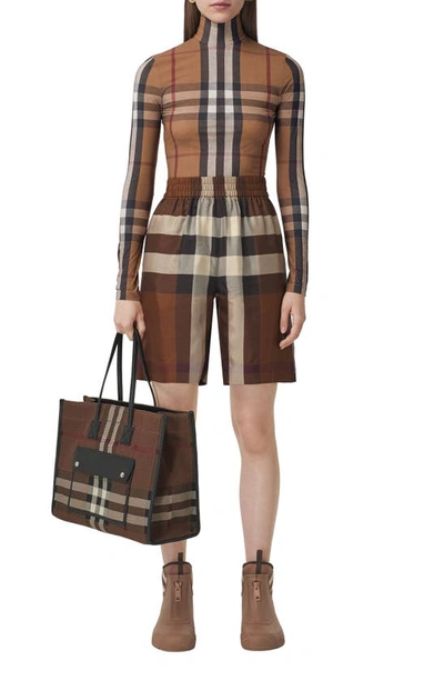 Shop Burberry Emery Check Turtleneck Top In Birch Brown Ip Chk