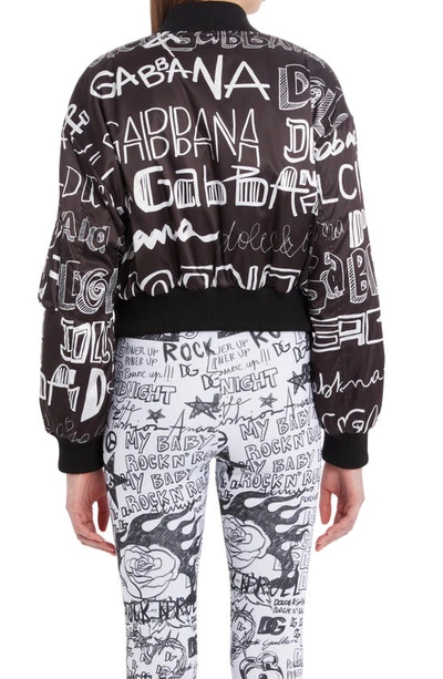 Shop Dolce & Gabbana Graffiti Logo Crop Bomber Jacket In Hnsfw Logo4 Bco Fdo Nero