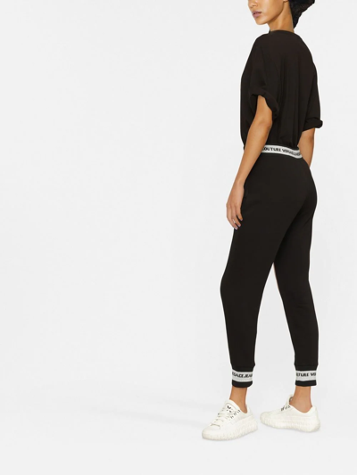 Versace Jeans Couture V Emblem Embroidered Track Pants In Schwarz